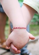 Young brothers holding hands