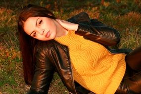 black hair girl in a leather jacket