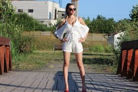 fashionable girl on a bridge