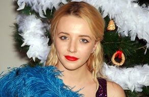 blonde with red lips in Christmas tinsel