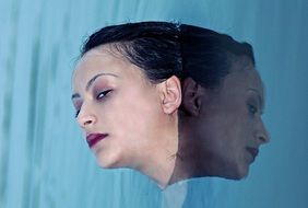young Girl head with Reflection on Water