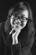 black and white portrait of a woman in eyeglasses