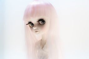 doll with big eyes and white hair