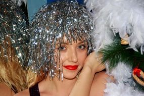 girl in tinsel for the new year