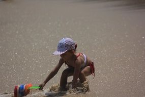 Kid playing on a beach