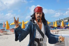 Pirate on the beach as a statue