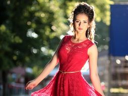 woman in red lace dress