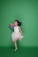 happy girl with balloons