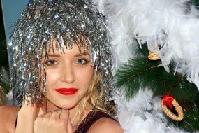 portrait of girl in shiny tinsel for the new year