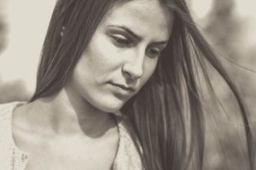 black and white portrait of a pensive girl