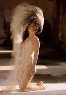 female ballet dancer with flour