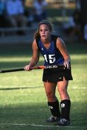 girl with stick, Field Hockey Player in Game