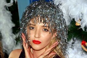 Christmas tinsel on the girlâs head