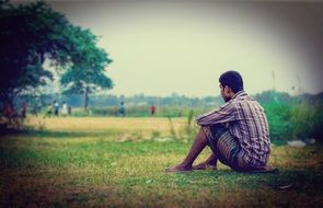 thoughtful man quietly dreaming in nature