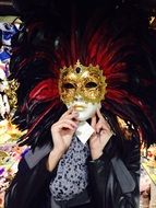 the man with the beautiful carnival mask