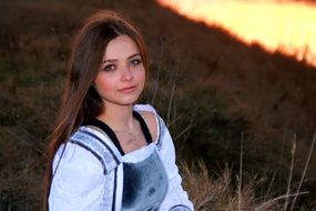 girl like a princess at sunset
