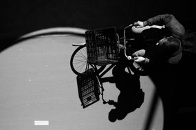 Man riding Bicycle, top view, Black And White