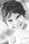 Black and white photo of the playing child