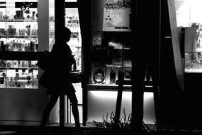 black and white photo of a girl outdoors in Osaka Japan