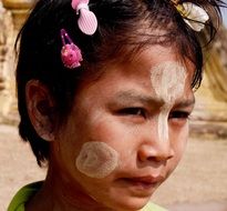 girl in thanaka in Myanmar