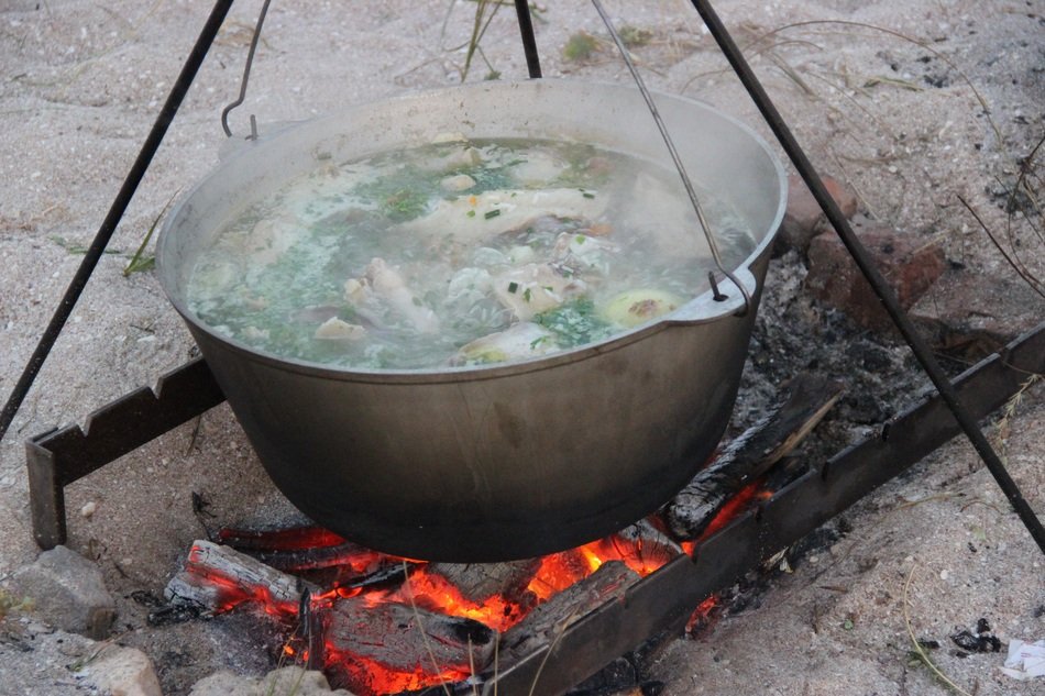 food in a pot at the stake