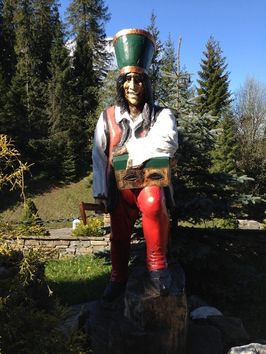 wooden sculpture of mountaineer