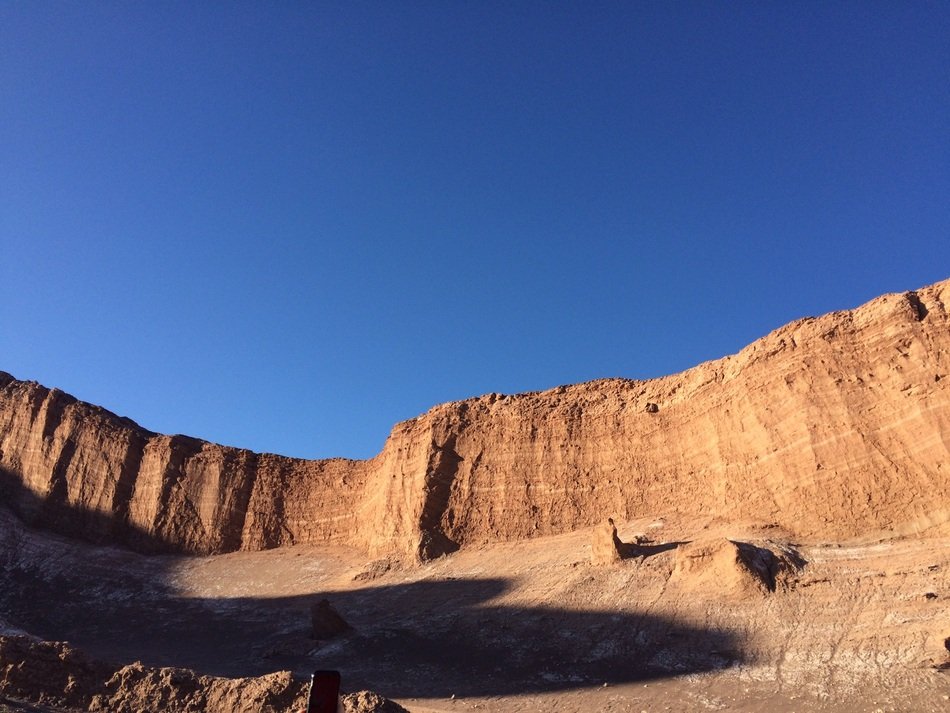 spectacular photo of brown mountains under the sun