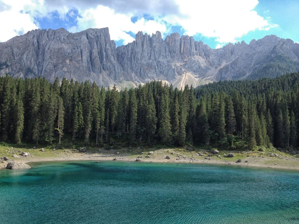 Carezza Lake at the foot of the Dolomites