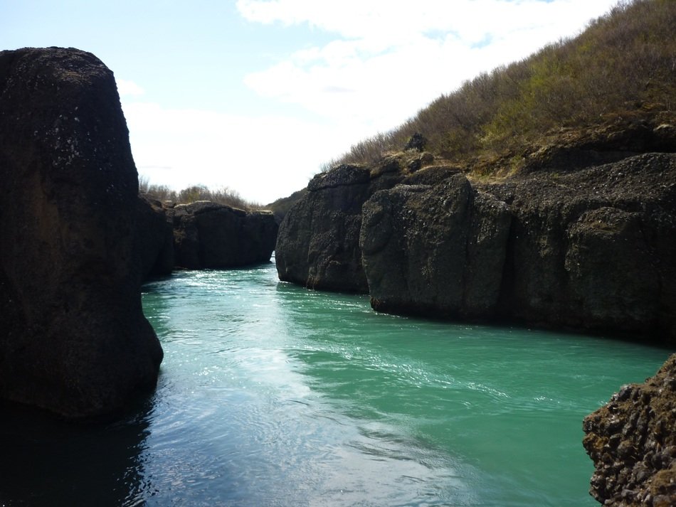 river with blue water among the stones
