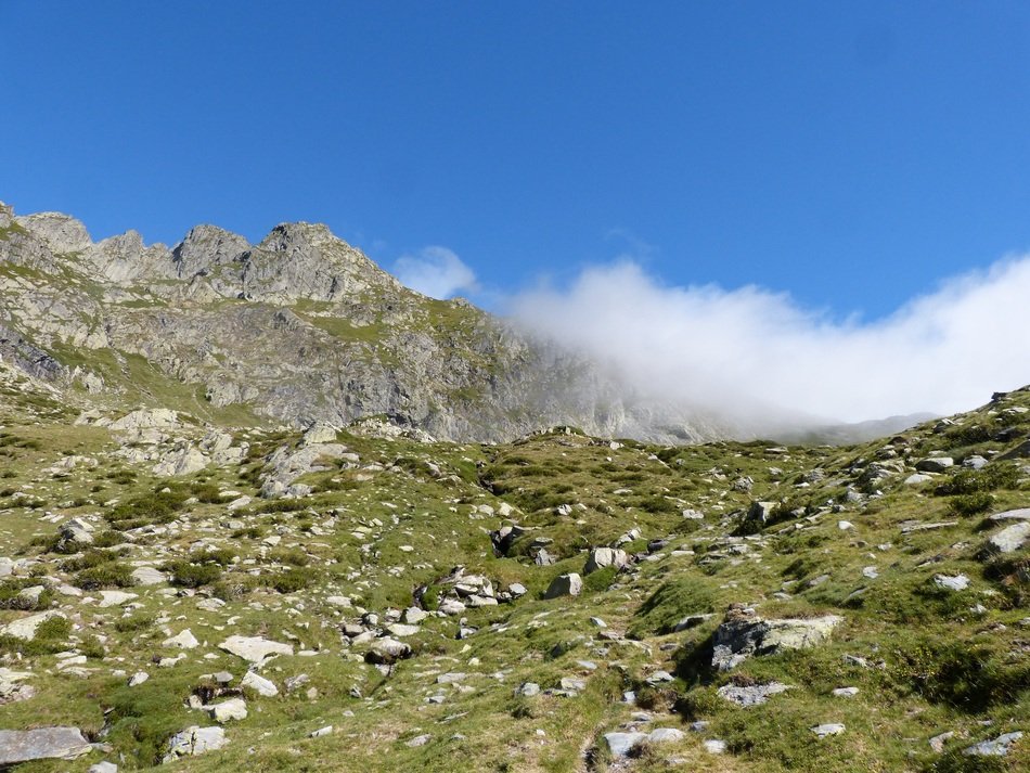 landscape of clouds over a mountain pass in the pyrenees