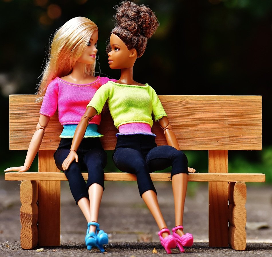 Barbie girlfriends on the wooden bench