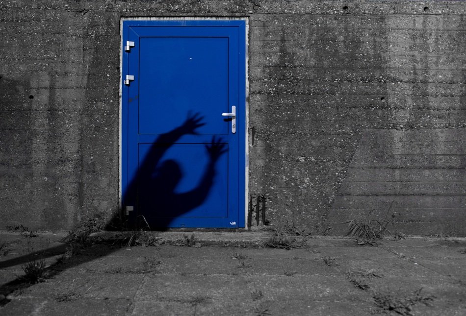 Shade on the blue door