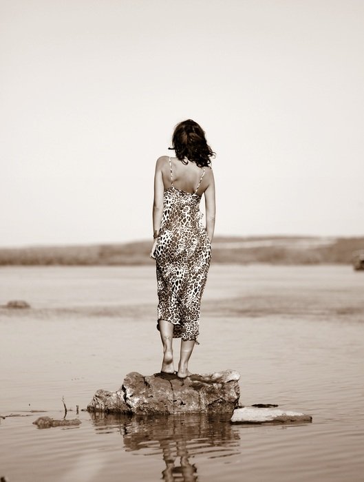 monochrome picture of a woman in sexy dress