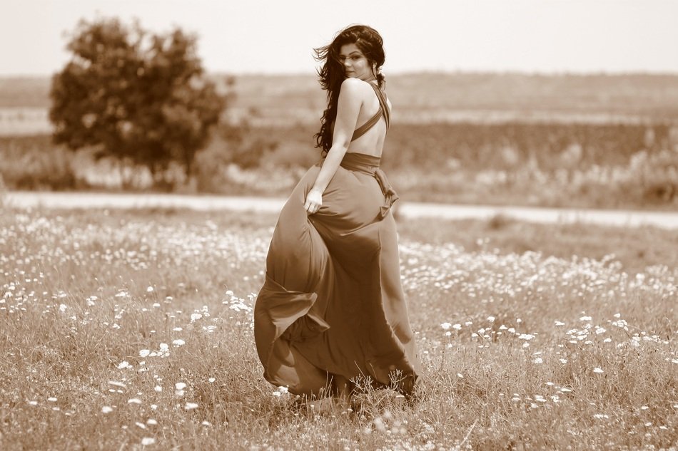 model on the wild meadow