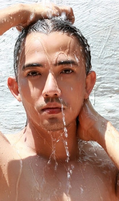 Man's face in water