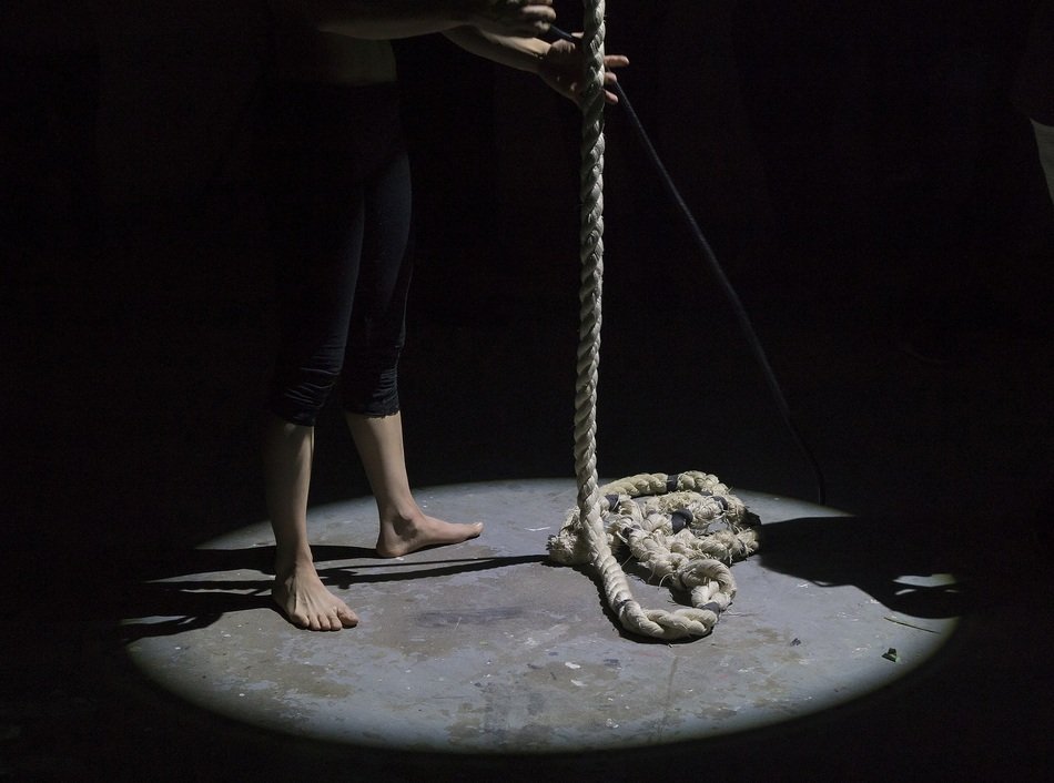 photo of magician's legs and rope