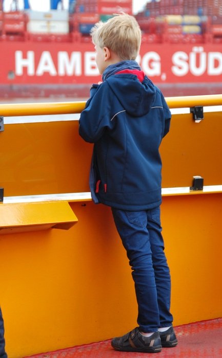 child Boy in Port at fence, germany, Hamburg