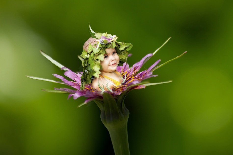 little girl in a flower bud