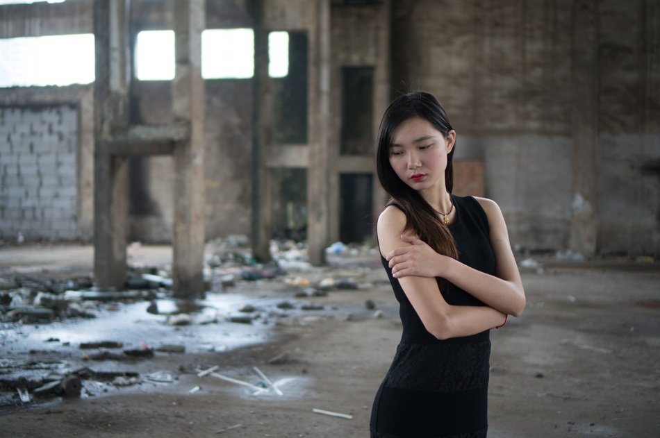 beautiful asian model in abandoned factory