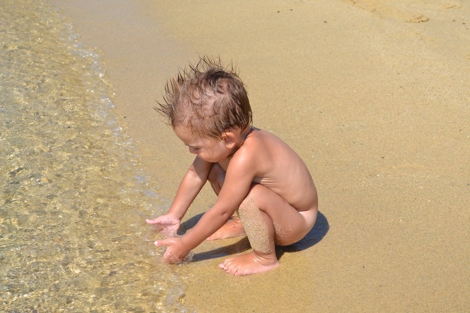 Kid on the beach on the holiday