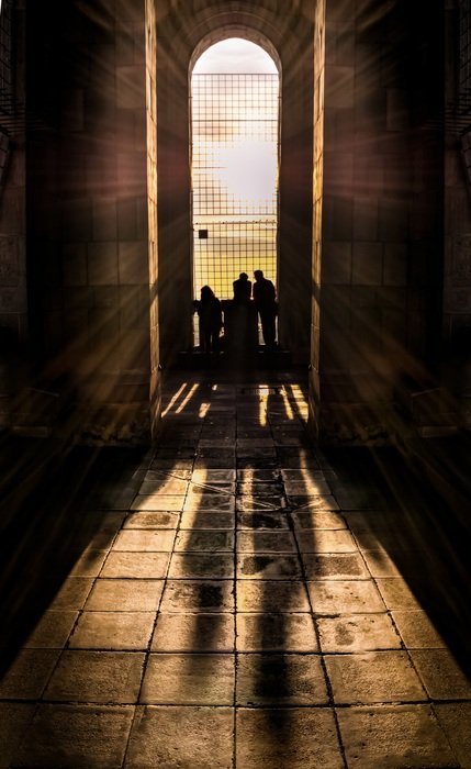 people in the corridor of the building
