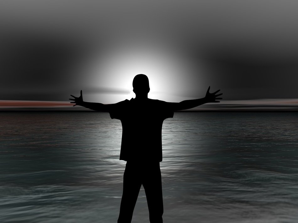 silhouette of a man on the skyline