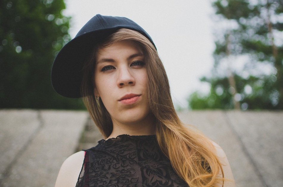 teenageer in cap