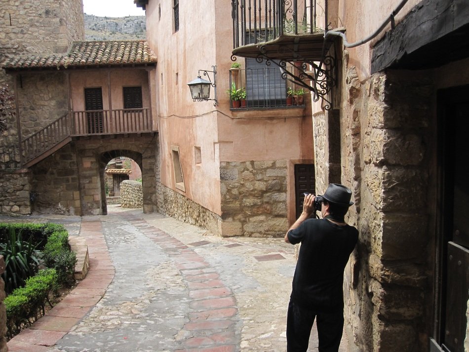 photographer in the alley of the old city