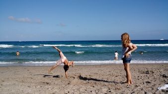 teenagers have fun on the beach
