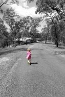 walking child on a road