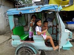 poor children in traditional transport