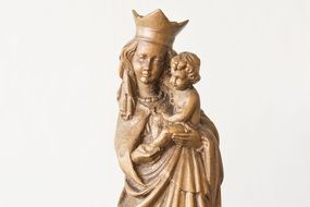 brown religious statue of Mary with a child