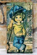 old graphic image of a boy in a blue cap
