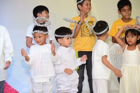 Kids in angel costumes